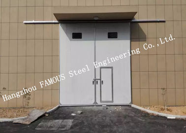 Κίνα Τμηματικές οριζόντιες συρόμενες βιομηχανικές πόρτες γκαράζ με τη για τους πεζούς πόρτα πρόσβασης για το εργαστήριο προμηθευτής
